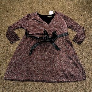 Long sleeve for and flare shimmer dress.